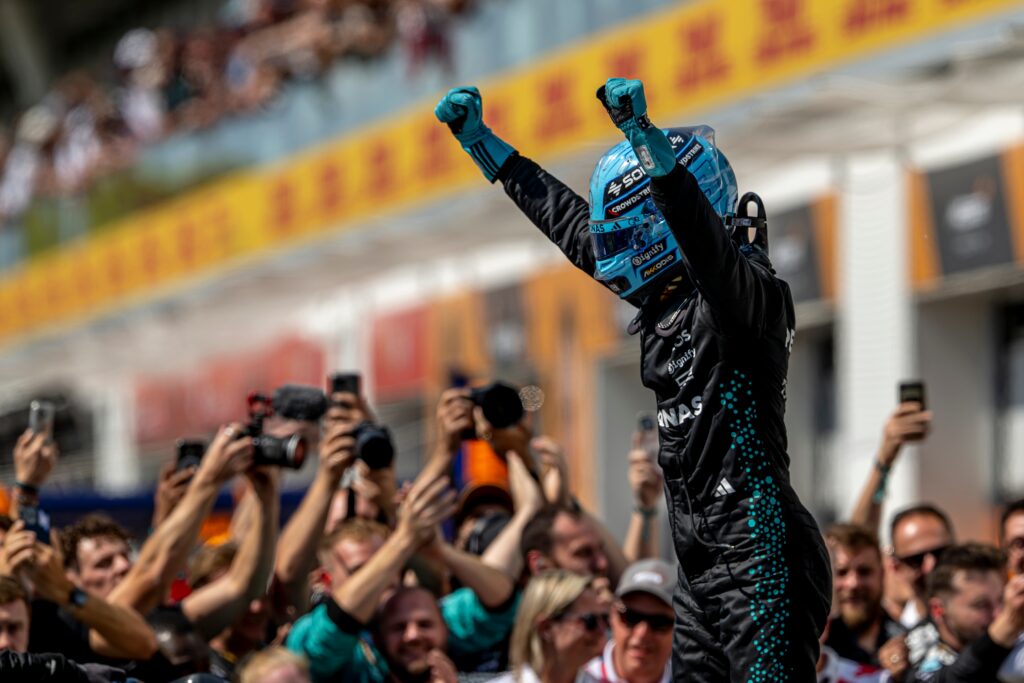 Russell Dominates Singapore as McLaren Teammates Clash